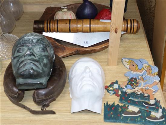 A wooden bowl, novelty penknife, leather support collar, two death masks, etc.